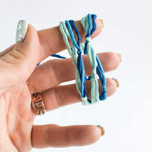 Load image into Gallery viewer, Aquamarine 4 Strand Boho Forget Me Knot Wrap Adjustable Bracelet